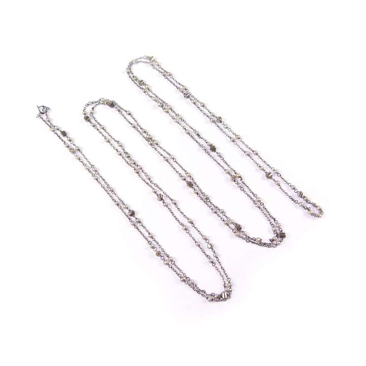 Early 20th century pearl and diamond long chain necklace